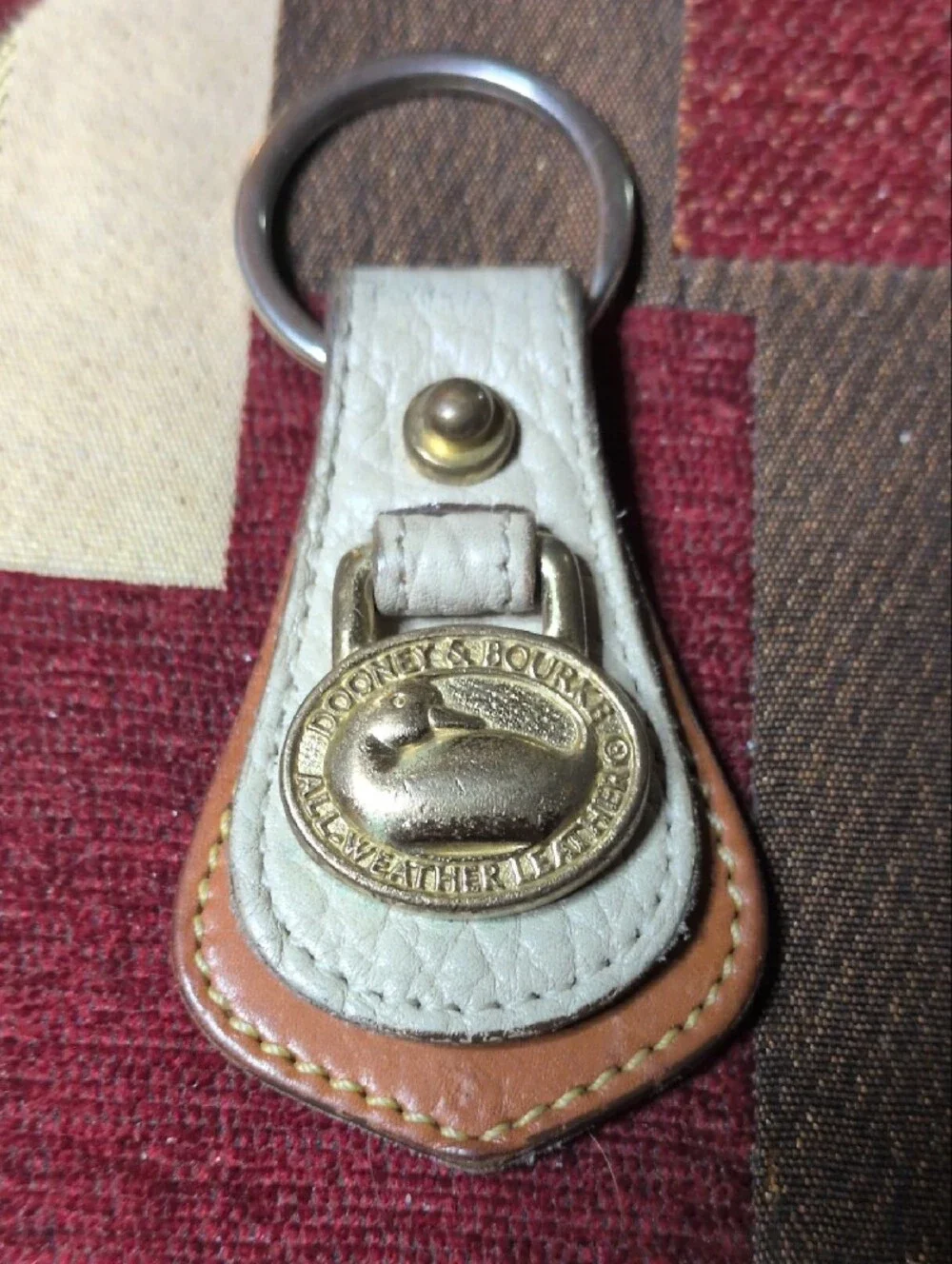 Dooney & Bourke White and Brown Leather Key Holder with Brass Medallion